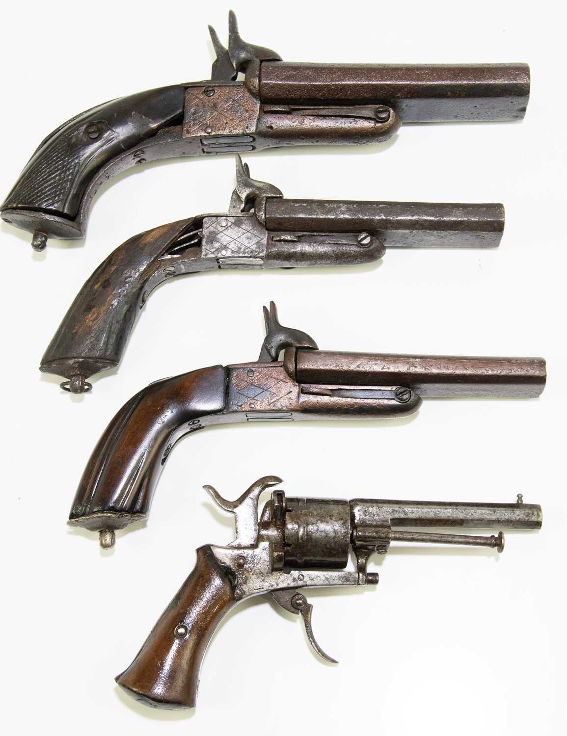 Lot 621 - Three side-by-side percussion cap pistols and...