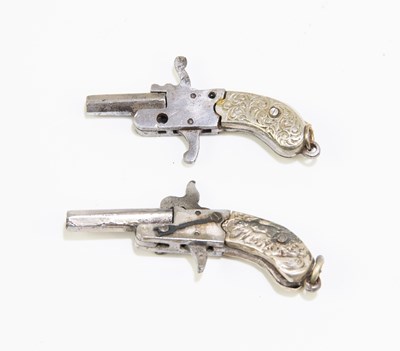 Lot 608 - A cased pair of miniature pin fire pistols,...