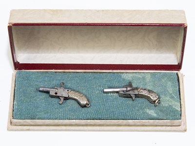 Lot 608 - A cased pair of miniature pin fire pistols,...