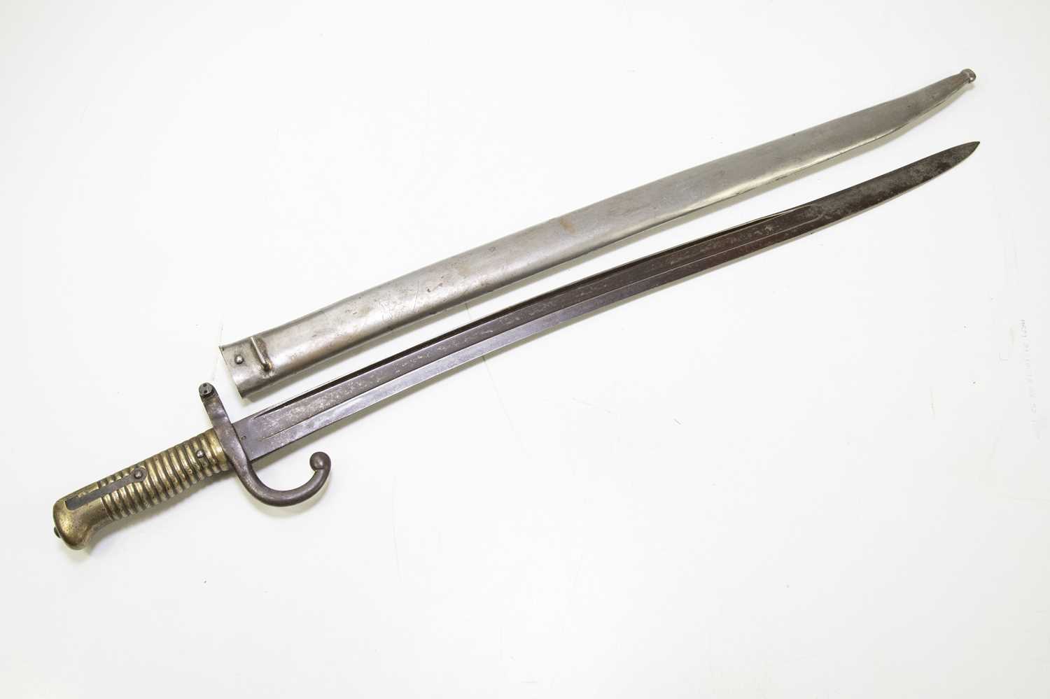 Lot 689 - A chassepot bayonet with metal scabbard and...