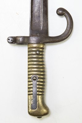 Lot 689 - A chassepot bayonet with metal scabbard and...