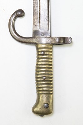 Lot 689 - A chassepot bayonet with metal scabbard and...