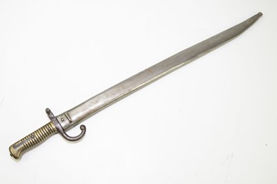 Lot 689 - A chassepot bayonet with metal scabbard and...