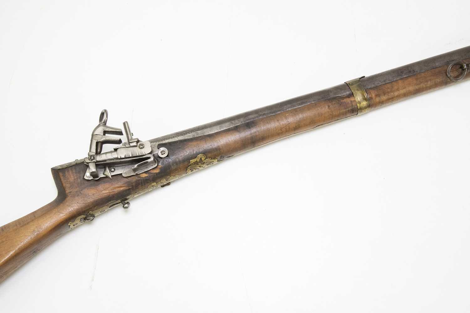 Lot 579 - An Indian matchlock three-band rifle, later