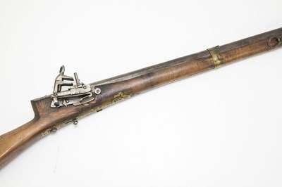 Lot 579 - An Indian matchlock three-band rifle, later...