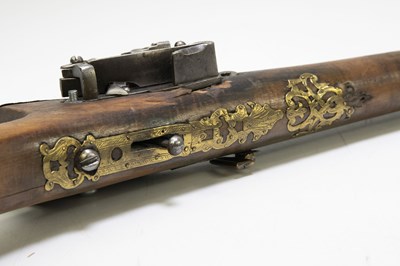 Lot 579 - An Indian matchlock three-band rifle, later...