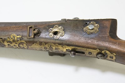 Lot 579 - An Indian matchlock three-band rifle, later...