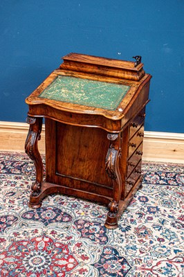 Lot 2428 - A Victorian walnut Davenport, the fall front...