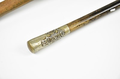 Lot 1024 - Two vintage walking canes, a similar walking...