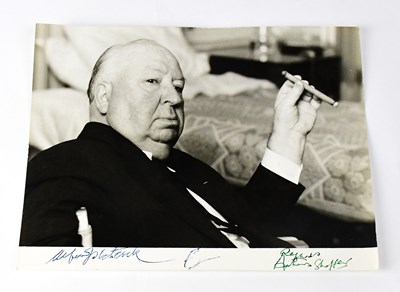 Lot 140 - ALFRED HITCHCOCK; a black and white...