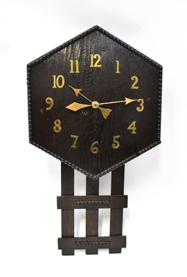 Lot 122 - An early 20th century American oak slat clock,...