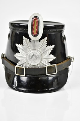 Lot 419 - A German Police shako with Westphalia badge.