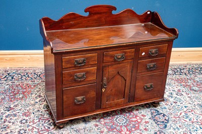Lot 2431 - A Victorian wash stand with raised back above...