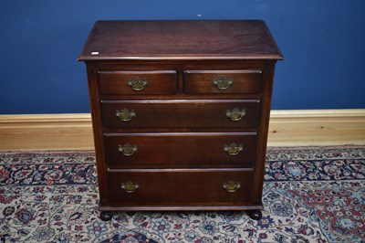 Lot 2589 - A reproduction oak effect chest of two short...