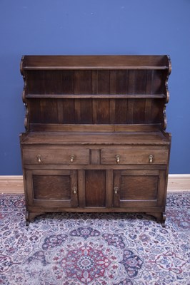 Lot 2521 - An early 20th century oak dresser with plate...