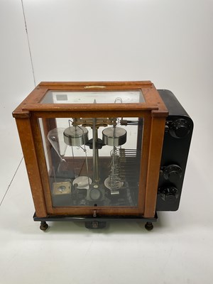 Lot 69 - A cased set of scientific analytical balance,...