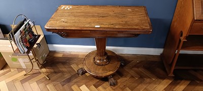 Lot 2390 - A Victorian rosewood fold over tea table, on...