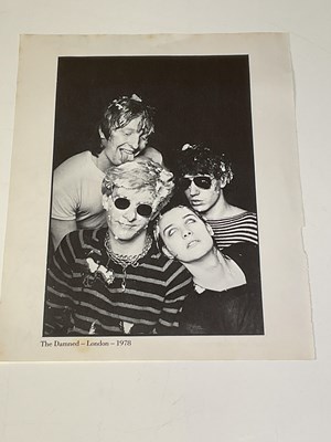 Lot 2091 - THE CLASH; a black and white book page...