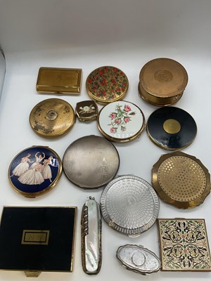 Lot 60 - A group of compacts including a circular...