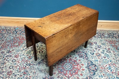 Lot 2500 - A Georgian oak rectangular drop-leaf gateleg...