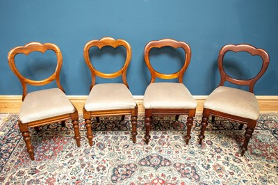 Lot 2451 - Four Victorian mahogany balloon back dining...