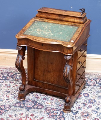 Lot 2433 - A Victorian walnut Davenport of typical form,...