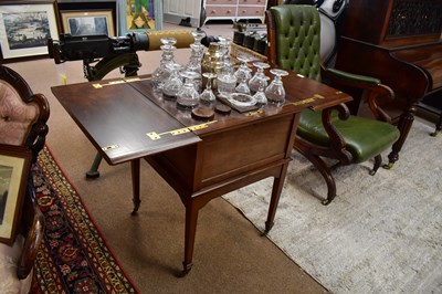 Lot 2513 - An early 20th century walnut surprise drinks...