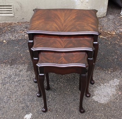 Lot 2613 - A nest of three reproduction mahogany tables,...