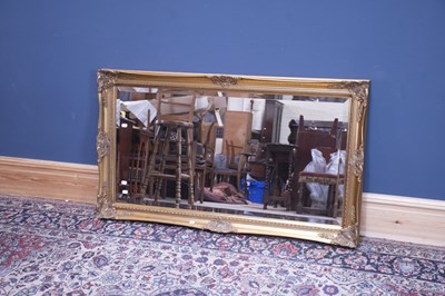 Lot 2528 - A large gilt framed rectangular bevelled wall...