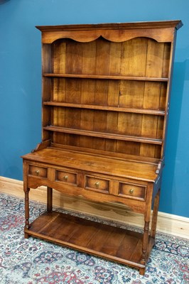 Lot 2580 - A reproduction oak dresser with plate rack...