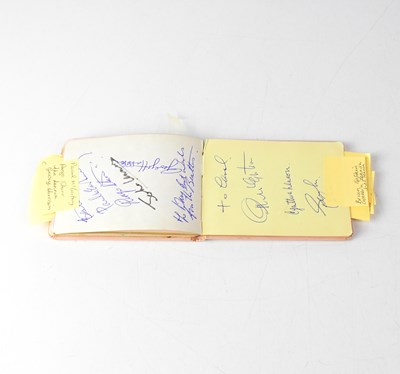 Lot 252 - A partially filled autograph book with...