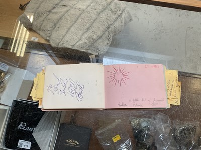 Lot 252 - A partially filled autograph book with...