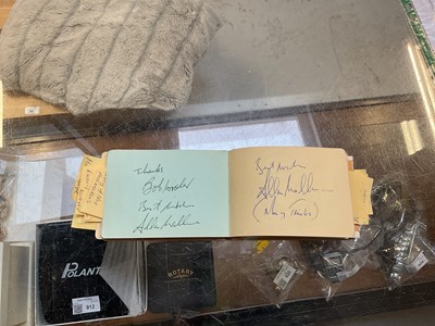 Lot 252 - A partially filled autograph book with...