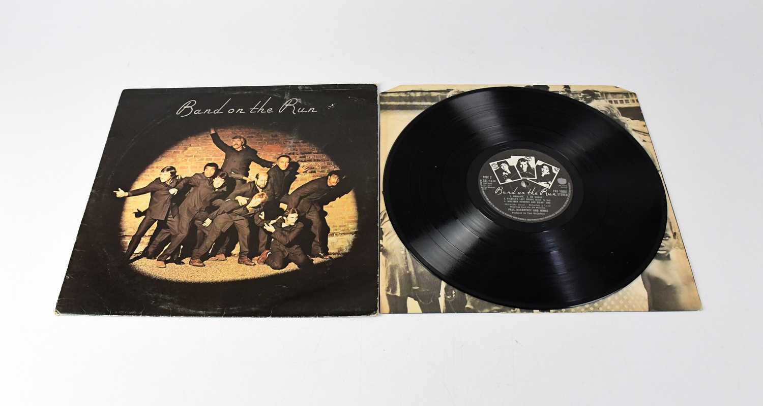 Lot 266 - WINGS; LP, 'Band on the Run', signed verso by...