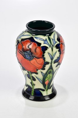Lot 88 - MOORCROFT; a ginger jar and cover, height 16cm,...