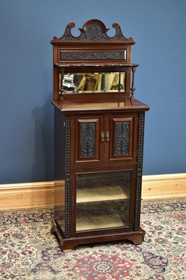 Lot 2403 - A Victorian music cabinet carved walnut music...