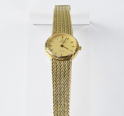 Lot 1061 - OMEGA; a De Ville gold plated ladies'...