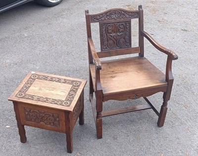Lot 2553 - A small carved oak elbow chair and a carved...