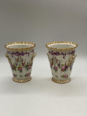 Lot 150 - SEVRES; a pair of late 19th century gilt...