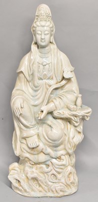 Lot 1065 - A large Chinese celadon glazed stoneware...