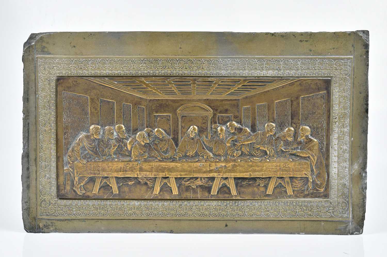 Lot 1139 - A brass plaque of the Last Supper, together...