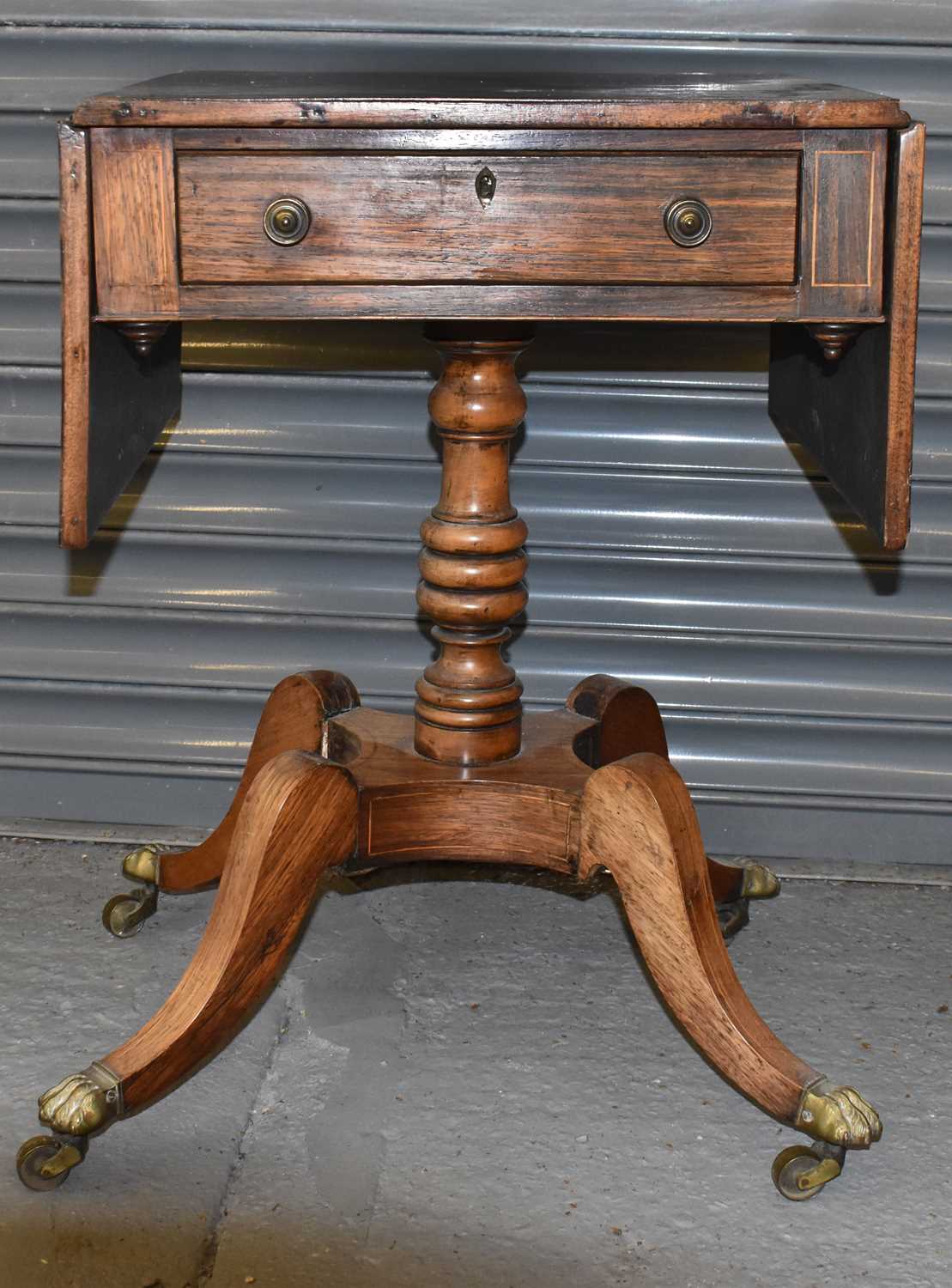 Lot 824 - An early 19th century rosewood drop leaf side...