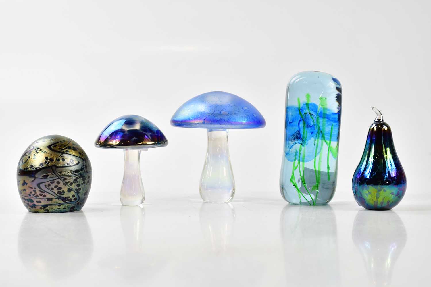 Lot 1556 - GLASFORM; an iridescent paperweight in the...