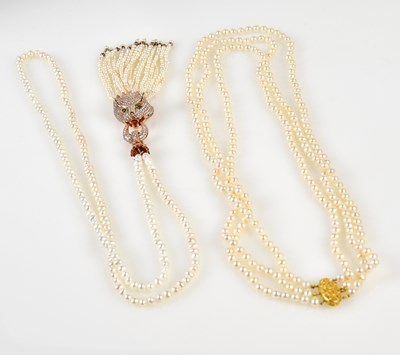 Lot 826 - A freshwater pearl necklace embellished with a...