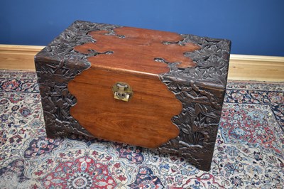Lot 2522 - A Chinese carved camphor wood blanket chest,...