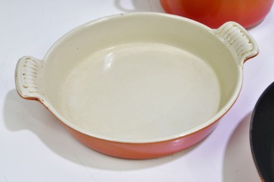 Lot 2304 - LE CREUSET; a collection of cast iron pans, a...