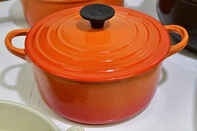 Lot 2304 - LE CREUSET; a collection of cast iron pans, a...