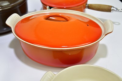 Lot 2304 - LE CREUSET; a collection of cast iron pans, a...