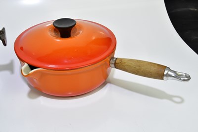 Lot 2304 - LE CREUSET; a collection of cast iron pans, a...
