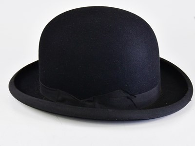 Lot 1079 - J. MOORS & SONS LTD; a bowler hat, approx size 7.